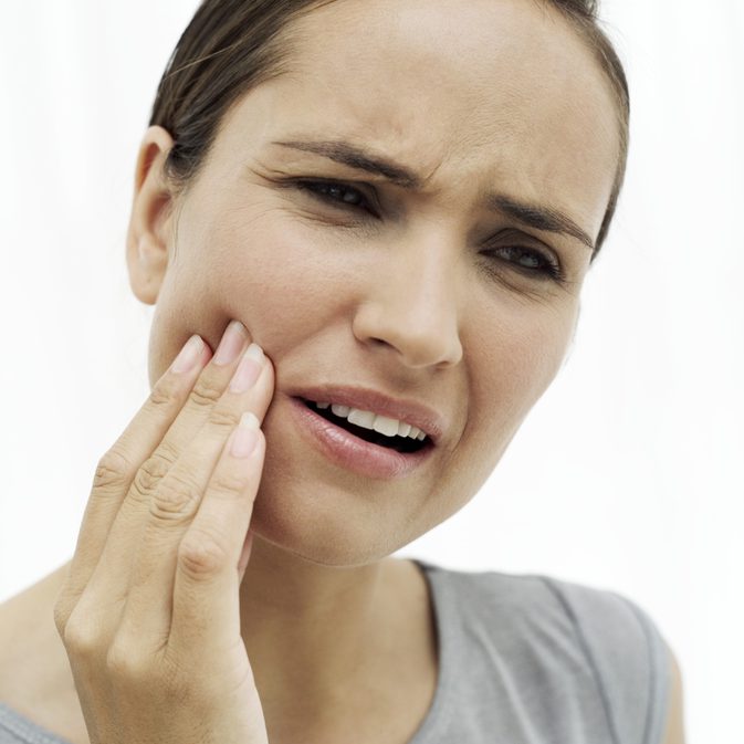 Причины боли в зубах